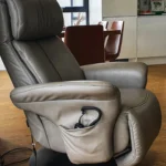 Himolla Sinatra rise and recline chair in grey leather.