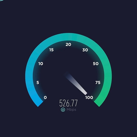 A speed test screenshot of the newly installed 5G WiFi at The Estuary Riverside Chalets. The speed shows 526.77 Mbps.
